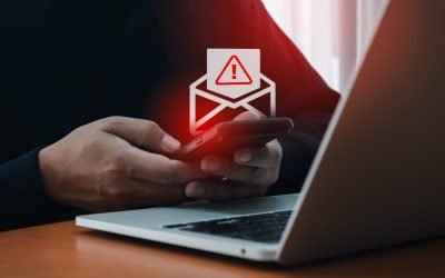 SMS spam and fake text message phishing from scammer concept. SMS hacked warning alert, email hack, scam malware spreading virus on message alert virtual on mobile phone screen in man's hands.